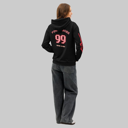 Female model turning to show the back of the Gamer Hoodie, clearly displaying the large 'FINAL BOSS 99' graphic. The image emphasizes the drop shoulder and comfortable streetwear style.