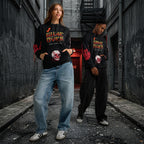 Male and female model wearing the 'Final Boss' Pixel Art Hoodie in a relaxed, unisex fit. The Dark Gaming Streetwear pullover features the 'GAME OVER' pixel font on the chest and a bold arcade skull graphic.