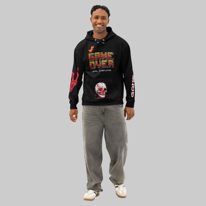 Male model wearing the 'Final Boss' Pixel Art Hoodie in a relaxed, unisex fit. The Dark Gaming Streetwear pullover features the 'GAME OVER' pixel font on the chest and a bold arcade skull graphic