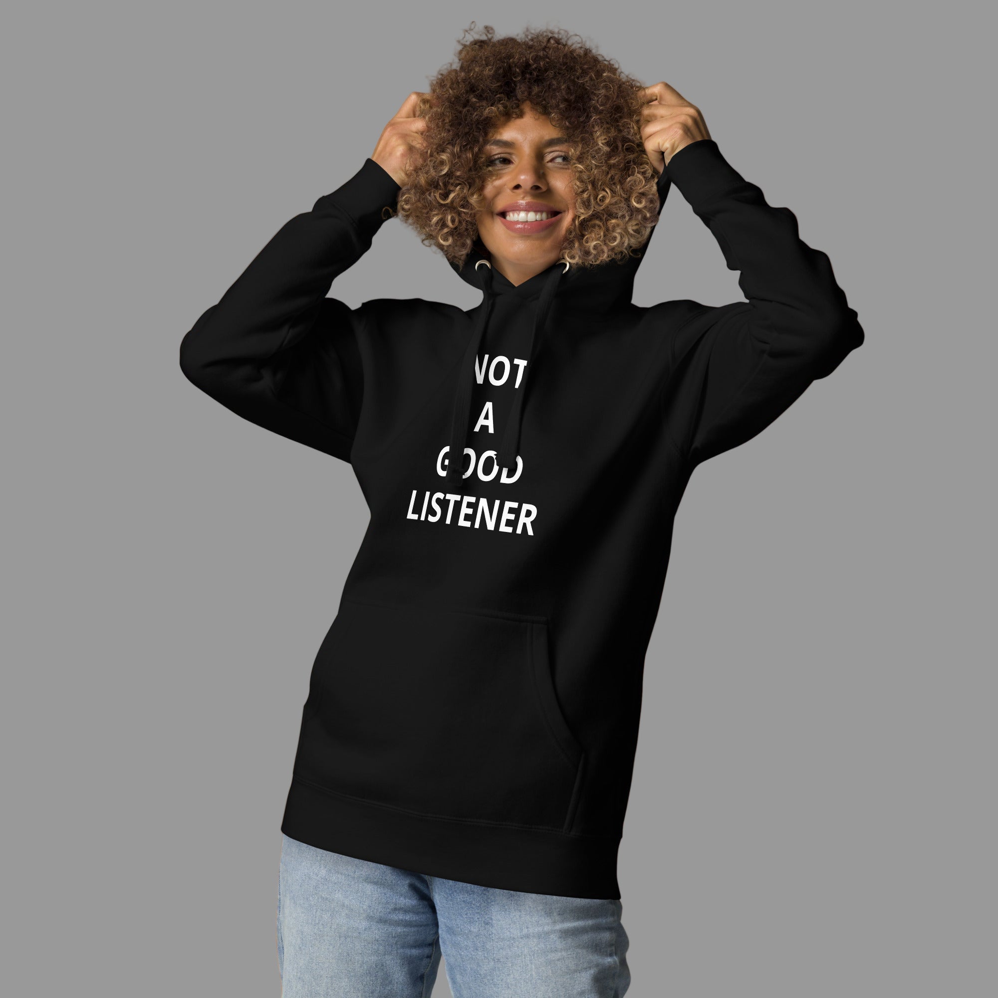 Young woman wearing the viral oversized hoodie with baggy jeans, showcasing the relaxed fit and streetwear aesthetic.