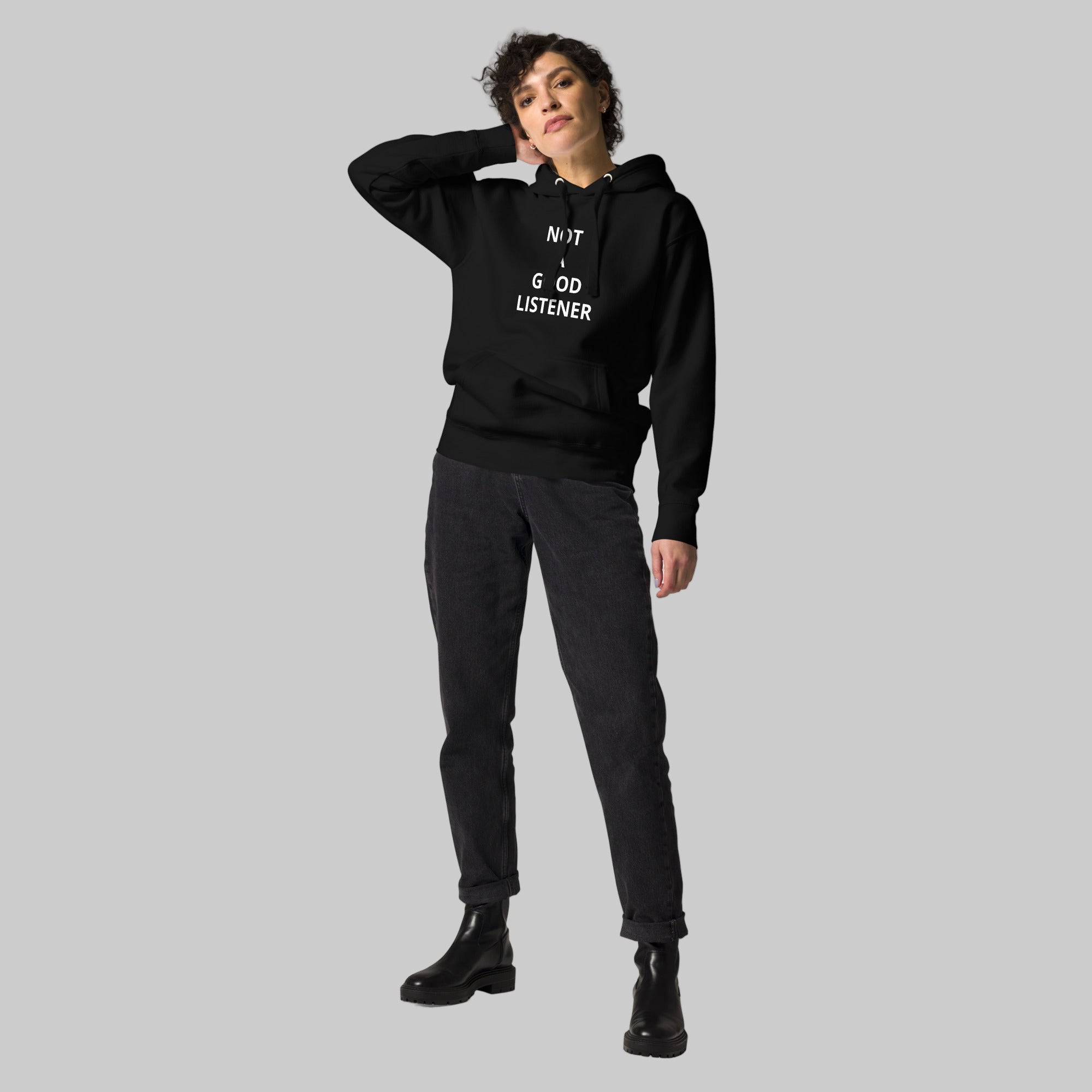 Young woman wearing the viral oversized hoodie with baggy jeans, showcasing the relaxed fit and streetwear aesthetic.