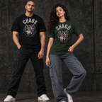 Male in black and female in forest green cyborg wolf tees in a dark urban setting